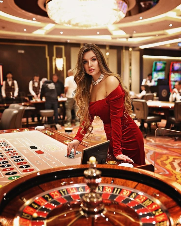 jlaaa Game Lobby displayed on a mobile phone showing slots and table game categories